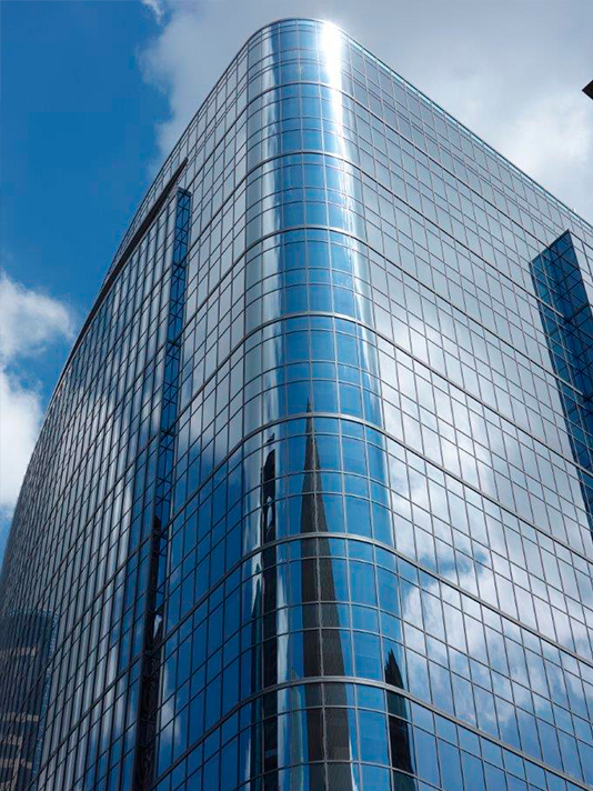 Hilcorp Energy Tower Block 256 rounded glass facade